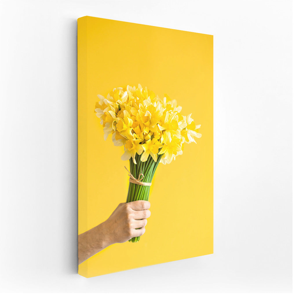 Sunny Daffodils: Male Hand with Bouquet on Bright Background
