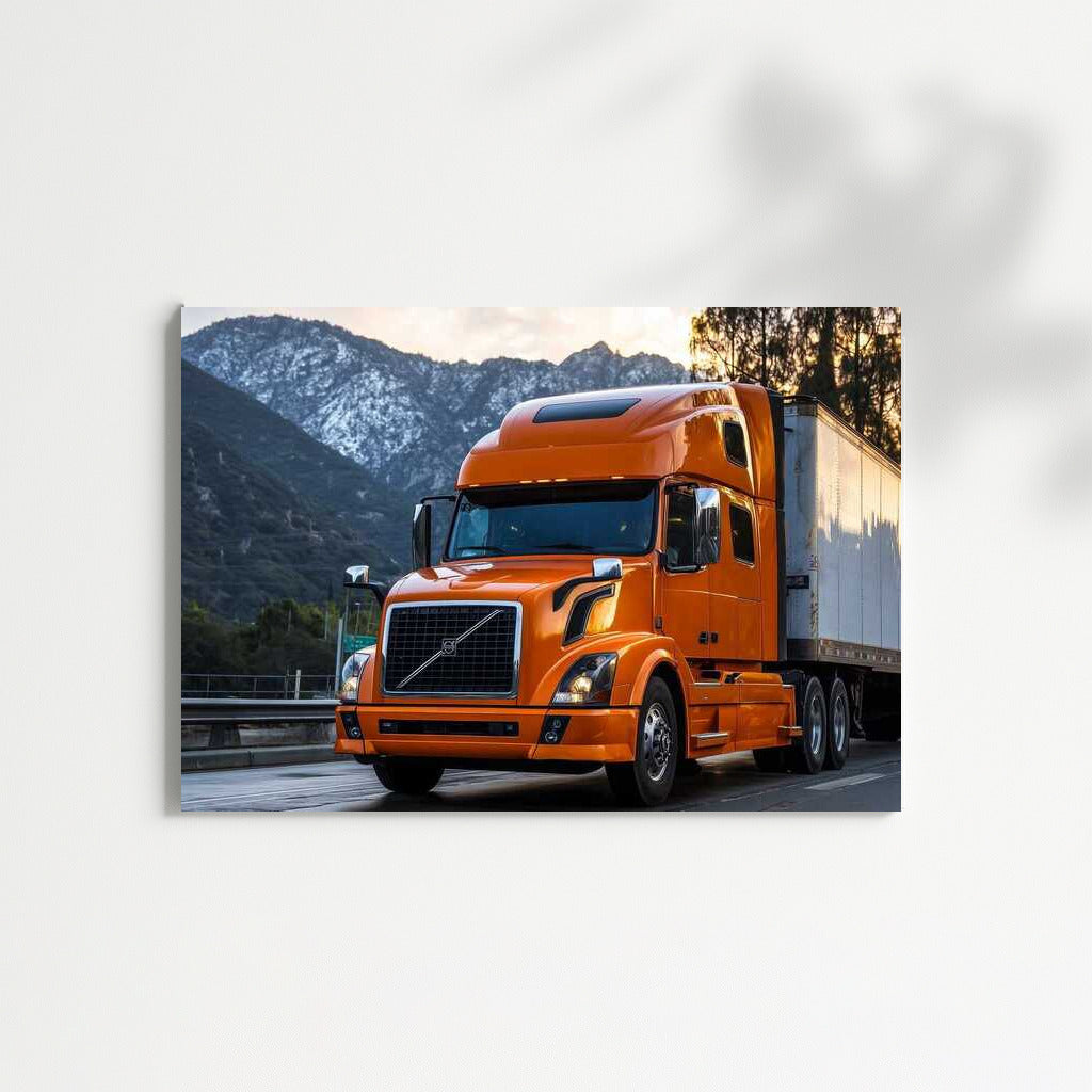 Volvo's Greatness: Orange Truck Among the Mountains