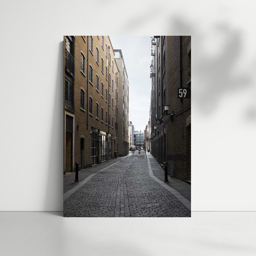 Urban Symphony: Narrow Street Between Brick Buildings
