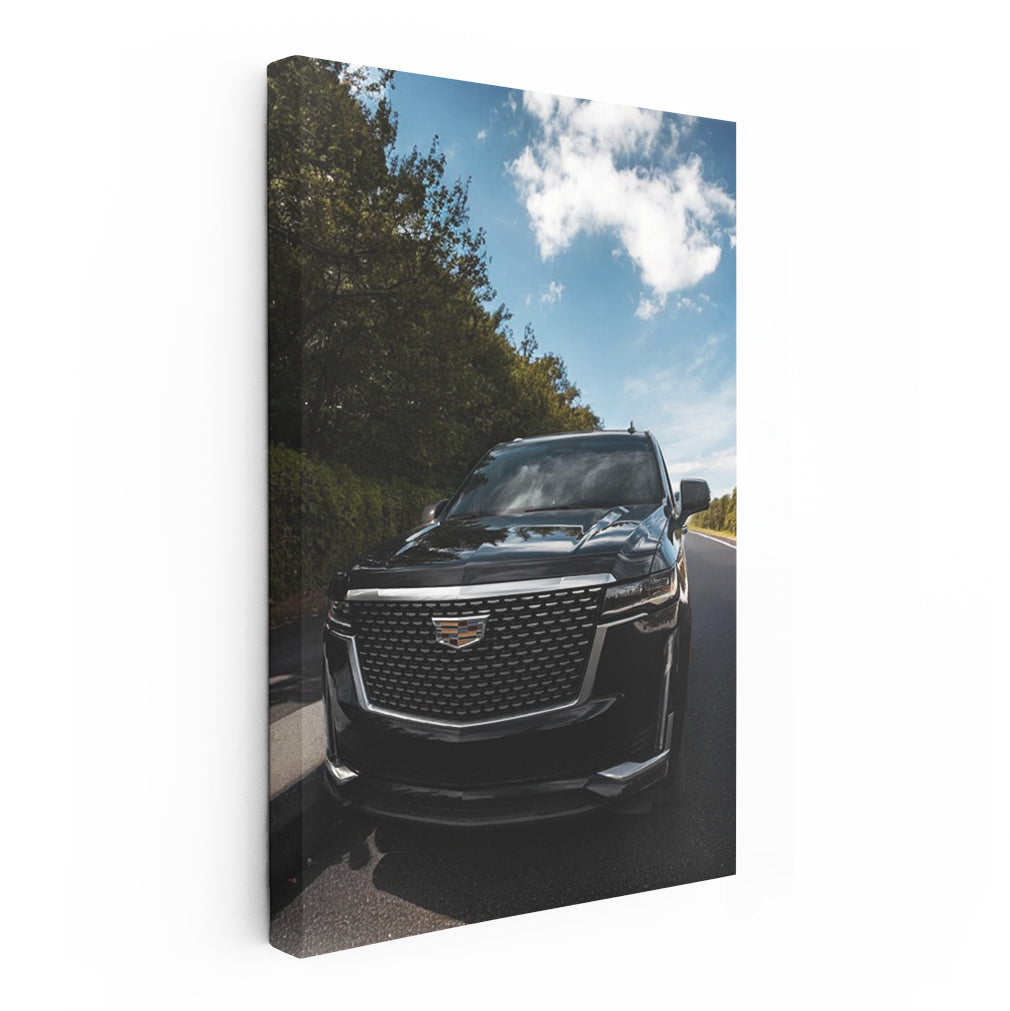 Sleek Black Cadillac Cruising Road - Elegance in Motion