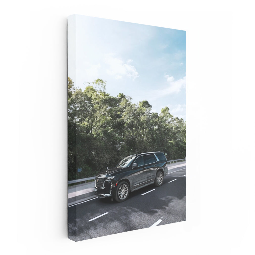 Sleek Black Cadillac Cruising Highway - Pure Luxury
