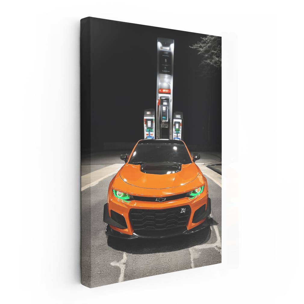 Vibrant Orange Chevrolet Camaro at Fuel Stop - Iconic Power