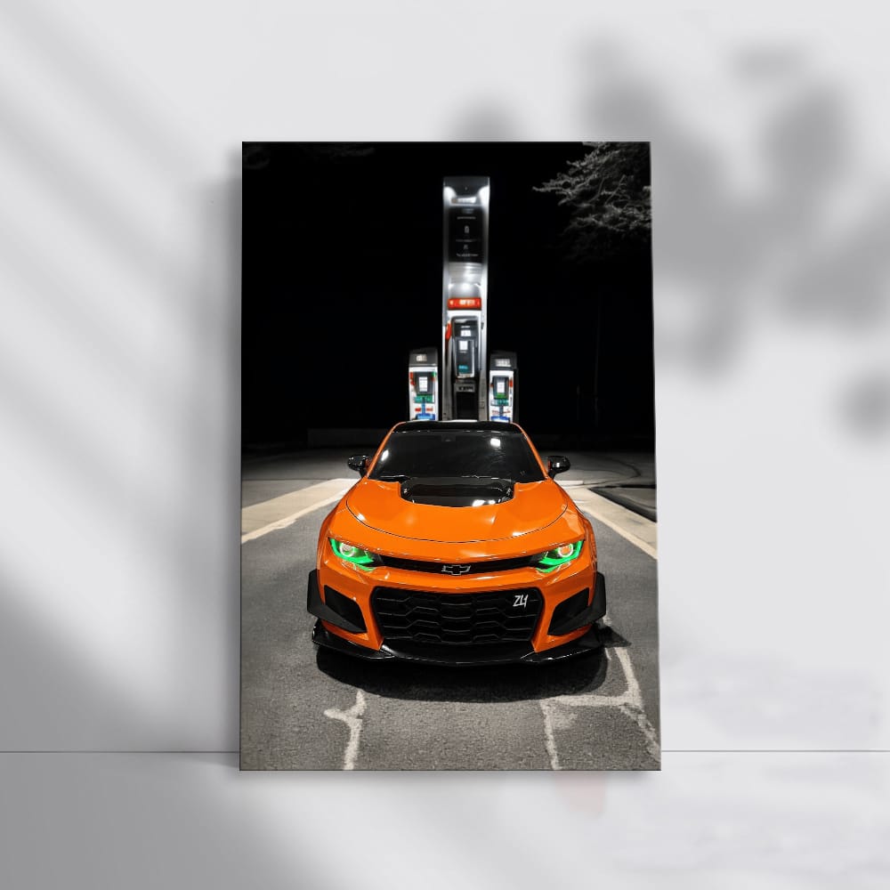 Vibrant Orange Chevrolet Camaro at Fuel Stop - Iconic Power