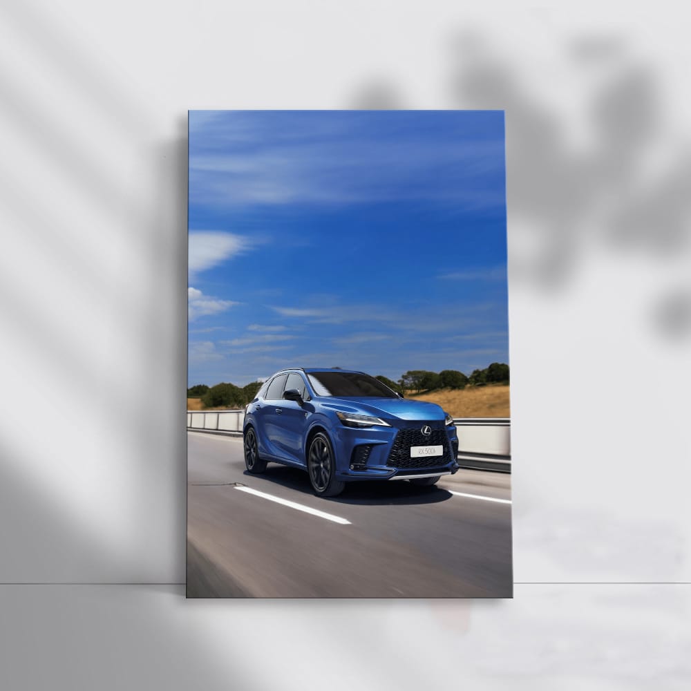 Blue Lexus RX Cruising Majestically on Open Highway