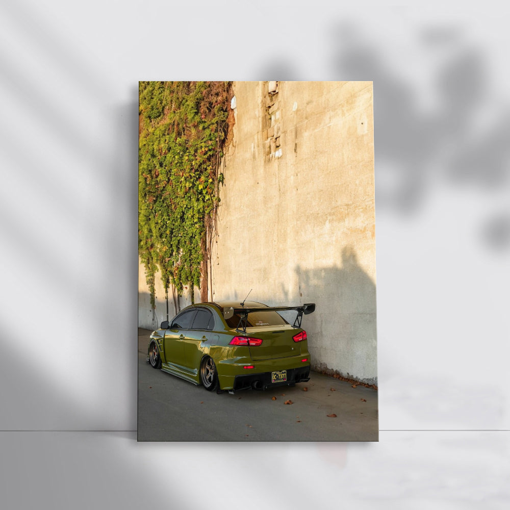 Green Mitsubishi Lancer by Wall - Sporty and Stylish