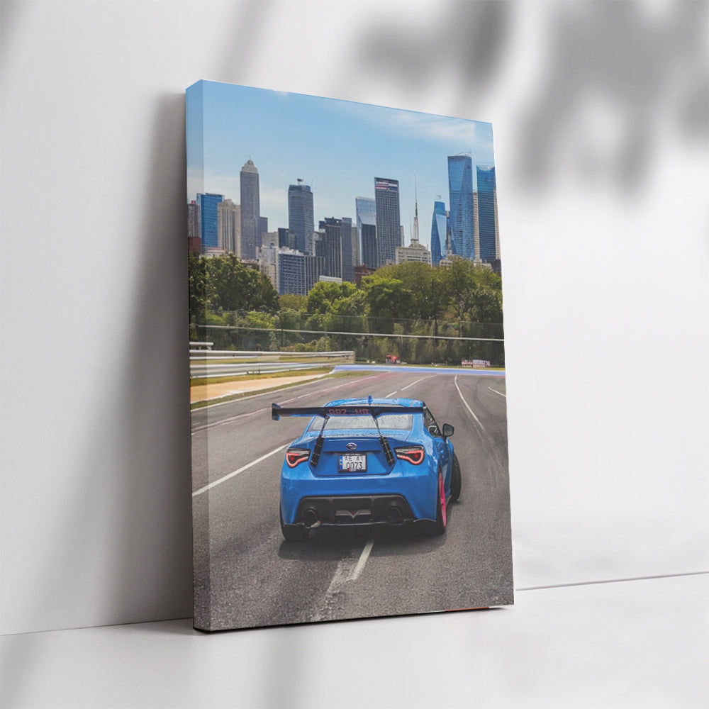 Blue Subaru BRZ Cruising Through Cityscape - Sporty Elegance