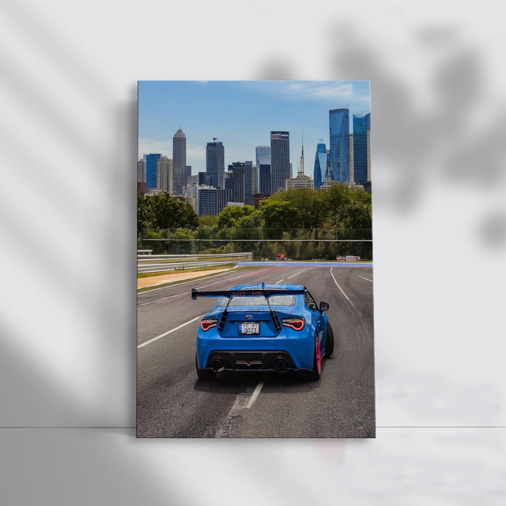 Blue Subaru BRZ Cruising Through Cityscape - Sporty Elegance