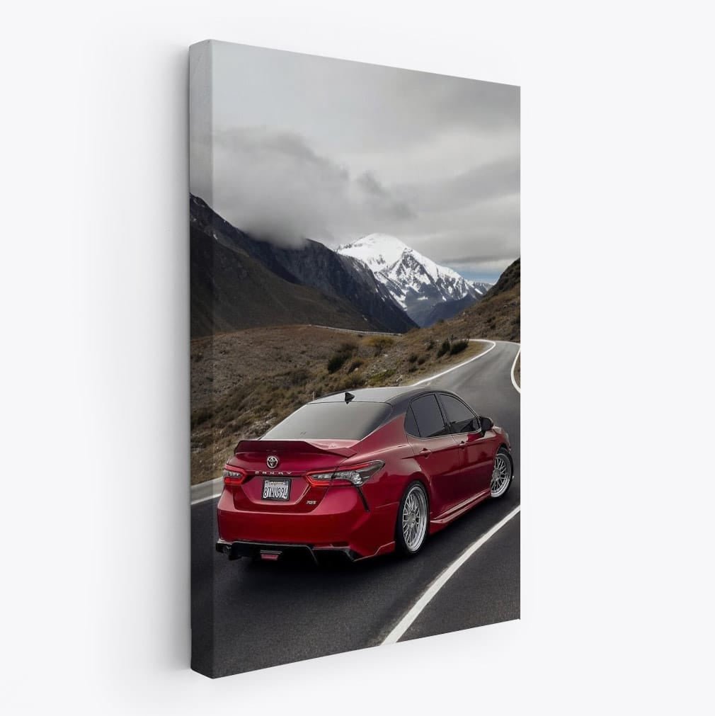 Toyota Camry 70 on Curvy Road, Snowy Peak Backdrop - Reliable Ride - EnjoyStore
